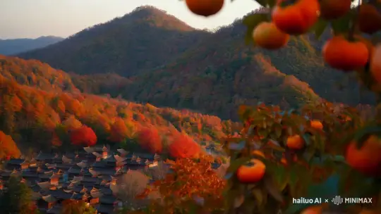 深秋的中国小山村，远处的村落，山峦起伏，柿子树布满了山野。 by Hailuo AI Video Generator