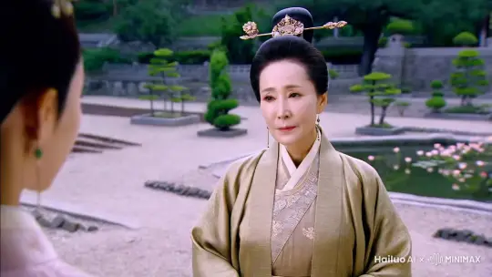 中国古代，一位四十岁，体态端庄，高绾发髻，头戴发簪，身穿唐代华贵服饰的富家夫人站在古香古色的园林中仪态端庄，神情哀伤的说话。 by Hailuo AI Video Generator