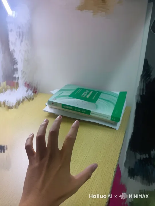图片中的手向前面的书发射能量，这本书慢慢升起，然后在空中开始燃烧，变成灰烬 by Hailuo AI Video Generator