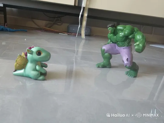 画面右边的绿巨人跳到很高很高的天空中一段时间后又重重落地，落地的同时双拳重重砸向地面，地面被震碎 by Hailuo AI Video Generator