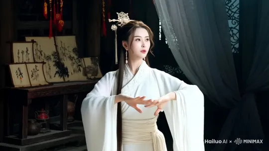 一个白衣古风女人，施展法术，身体四周有一条红龙随着女人的手势运动环绕，火龙对着镜头怒吼， by Hailuo AI Video Generator