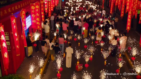 新春了，忙碌的街道上全是鞭炮声鞭炮皮，人们都在放鞭炮，财神爷从天而降给每户人家都发放金元宝 by Hailuo AI Video Generator