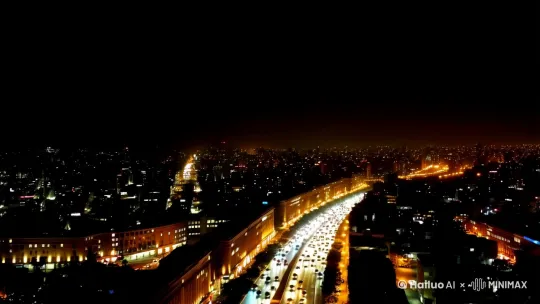 夜晚新年城市主干道上车辆的画面，从高处往下拍摄的镜头画面，路面上的车辆很小，每辆车都开着车灯，一辆接着一辆的前行，天空整体的背景是黑色的 by Hailuo AI Video Generator
