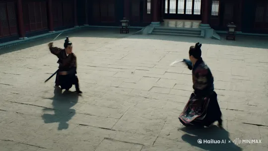 
两位身着传统武侠服饰的侠客在打斗，场景设定在古老的中式庭院中，明暗对比强烈，展现出打斗的激烈氛围。侠客们的服装细节丰富，刺绣精美，充满传统武侠风格。[0-0.5秒]: 高空俯视全景 (参数: 镜头高度80度, 速度-慢速)  
[0.5-1秒]: 环绕人物运镜 (半径5米, 速度-中速, 模式-流畅)  
[1-1.5秒]: 推近至剑刃特写 (焦距85mm135mm, 速度-快速)  
[1.5-2秒]: 甩镜衔接踢击 (方向左偏35度, 动态模糊强度70% by Hailuo AI Video Generator