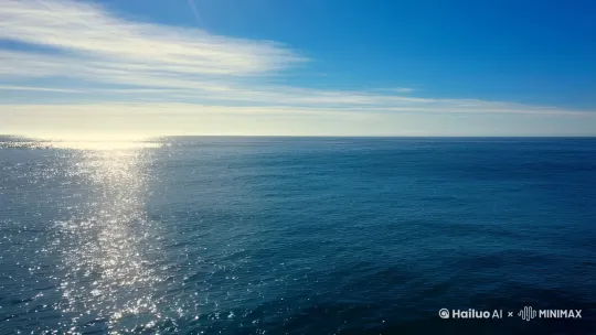 大海，是地球上最广阔的水域，它无边无际，与天际相接，仿佛是大自然最深邃的眼眸。海面时而平静如镜，映照着蓝天白云，时而又波涛汹涌，浪花飞溅，展现出无穷的力量与活力。

海水的颜色随着天空的变化和深度的不同而变幻莫测，从浅蓝到深蓝，再到墨绿，每一种颜色都蕴含着大海的神秘与深邃。阳光洒在海面上，波光粼粼，如同无数颗钻石在闪烁，美得令人窒息。

海风带着咸咸的味道，轻轻拂过脸庞，仿佛是大海在低语，诉说着它的故事。海浪拍打着岸边的礁石，发出阵阵轰鸣，那是大海的歌声，雄浑而激昂。

大海是生命的摇篮，孕育了无数的生物。从微小的浮游生物到庞大的鲸鱼，从五彩斑斓的珊瑚到形态各异的海藻，它们共同构成了一个复杂而精妙的海洋生态系统。

站在海边，望着那浩渺无垠的海面，人们会感受到自己的渺小与大海的博大。大海不仅是一个自然景观，更是一种精神的象征，它代表着自由、冒险、探索和无限的可能。 by Hailuo AI Video Generator