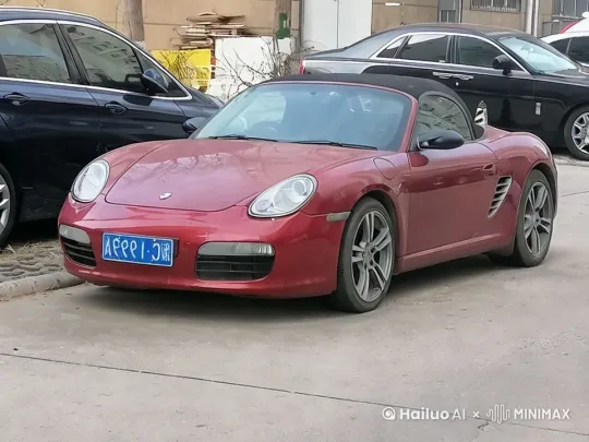 一辆停泊在城市停车场内的红色跑车，突然启动变形程序，车身剧烈震动，零件重组，瞬间化身成高大威猛的机器人战士。车牌闪烁着蓝色光芒，前灯化作锐利的眼睛，进气格栅成为坚不可摧的胸甲。机器人屹立于两辆黑色轿车之间，四周是灰色水泥地面与杂乱背景，远处高楼林立。近景，采用低角度拍摄，展现机器人震撼的变身过程，充满力量感与科技感。[推出,上升,下摇] by Hailuo AI Video Generator