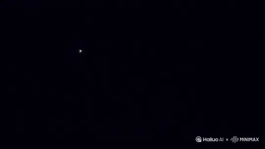 在一片漆黑中突然出现了一点火星，火星闪烁了几下之后熄灭，最后突然凭空升起一小团火焰，整个画面里除了火焰没有任何东西。 by Hailuo AI Video Generator