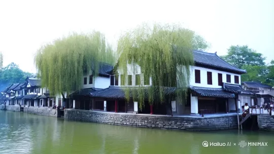 【探秘周庄古镇,品味千年水乡韵味】
在江南的温柔怀抱中,藏着一座千年古镇——周庄,它如同一幅淡雅的水墨画,静静铺展在时光的长河里,等待着每一位旅人的轻抚。
漫步周庄,石板路两旁是白墙黛瓦的古宅,小桥流水人家,每一砖一瓦都诉说着往昔的故事。乘一叶扁舟,穿梭于狭窄的水巷间,两岸垂柳依依,偶尔几声吴侬软语飘过,让人恍若隔世。夜幕降临时,古镇更添几分神秘与浪漫,灯笼渐次亮起,光影交错间,周庄仿佛穿上了一袭华丽的晚礼服,等待着与你的浪漫邂逅。
而说到周庄,怎能不提那令人垂涎的美食小吃?万三蹄,以其肥而不腻、酥而不烂著称,每一口都是对味蕾的极致诱惑;阿婆茶,一杯清茶,几碟小食,围坐一起,体验最地道的江南慢生活;还有那沈万三糕团,软糯香甜,每一口都是对甜蜜生活的向往。更有各式各样的水乡小吃,如袜底酥、青团等,让人在品味中感受周庄的深厚文化底蕴。
来吧,走进周庄,不仅是一场视觉的盛宴,更是一次味蕾的旅行。在这里,你可以放慢脚步,细细品味那份属于江南的宁静与美好,让心灵得到真正的休憩与释放。周庄,不仅仅是一个地名,它是一种情怀,一种向往,等待着每一个热爱生活、渴望探索的你,来此寻觅那份属于自己的水乡记忆。 by Hailuo AI Video Generator