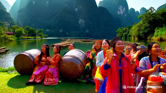 镜头：广西山水画卷展开，漓江竹筏与壮乡铜鼓交相辉映，各族群众身着传统服饰载歌载舞。  
   - 特效：AI生成的多民族虚拟数字人“桂仔”（白头叶猴形象）从山水间跃出，挥手致意。  
   - 旁白：“在山水甲天下的广西，民族团结的基因深植血脉，科技赋能让传统焕发新生。”。视频比例：9：16 by Hailuo AI Video Generator