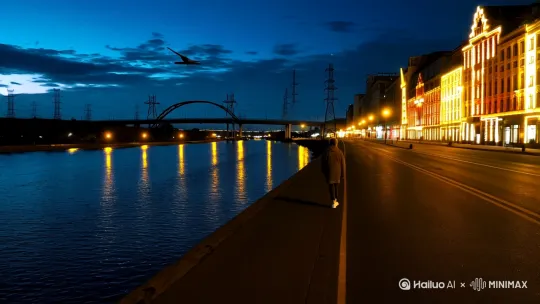 画面场景：整体呈现的是城市夜晚的街景。镜头从一个较高位置俯瞰，展现出笔直延伸向远方的道路，路的一侧是平静如镜的河面，河面上倒映着路灯暖黄色的光，波光闪烁。远处高架桥横跨画面，旁边电塔整齐排列。右侧是灯火辉煌的楼宇。天空中有缓缓飘动的云絮。

• 角色动作：可以安排一位行人沿着道路慢慢踱步，偶尔驻足欣赏河面景色，表现出沉浸在这夜晚氛围中的状态，增加画面的灵动性。

• 色彩风格：以深蓝色的夜空为背景主色调，道路呈深黑色，河面是深邃的蓝黑色并反射暖黄灯光。高楼大厦的灯光色彩多样但以暖色调为主，营造出一种温暖且宁静的浪漫氛围。 by Hailuo AI Video Generator