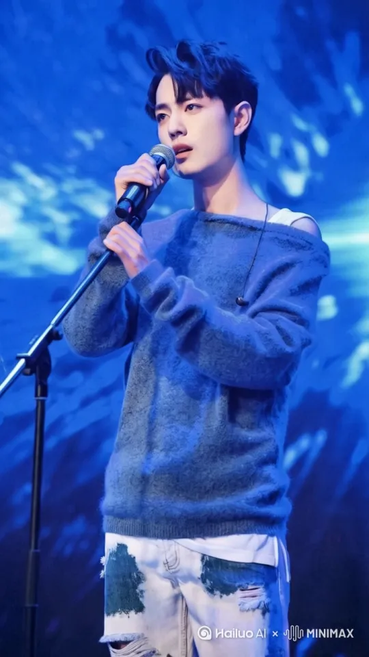 帅哥在五彩斑斓的舞台上，单手扶话筒，身体跟着音乐韵律轻轻摇摆，背景屏幕画面不断切换 by Hailuo AI Video Generator