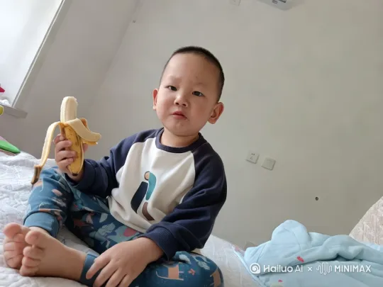 祝小男孩儿童节快乐，背景换成梦幻汽车王国，小男孩一跃飞起 变成太空超人！由远及近运镜有慢镜头 by Hailuo AI Video Generator