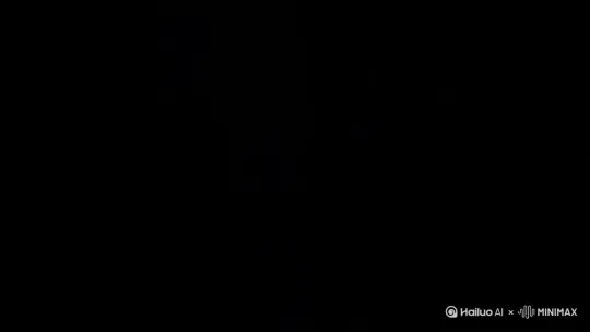 分镜1: 俯视角镜头缓慢下降，焦墨竹干以斧劈皴笔触从纯黑背景中渐显。刚劲的竹节纹理与淡墨披麻皴枝叶形成肌理对比，月光穿透竹林缝隙形成朦胧光斑。传统水墨留白意境与现代胶片银盐颗粒微妙共存。

分镜2: 竹林深处枝叶随夜风轻颤，披麻皴的淡墨笔触如水波荡漾。月华织就的光网在竹影间流动，焦墨枝干在俯视镜头下延展出优雅弧度。高光区域的胶片结晶质感和宣纸肌理交织出诗意画面。 by Hailuo AI Video Generator