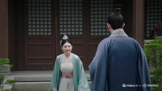 顾倩兮微微一笑,她见那书生兀自背对自己,想这人学识广博,侠义心肠,倒是不能不见上一面,便轻轻走到那书生身旁,道:“这位公子见识不凡,小女子佩服得很。”
那书生见她过来,却急急转过了身,背对着她,并不言语。
顾倩兮心下一奇,想道:“这人是怎么了,怎地如此奇怪?”登即走到那书生面前,抬头去看,霎时全身大震,颤声道:“是……是你……”
眼前这人长身玉立,剑眉入鬓,正是卢云。
顾倩兮震惊之下,不由退开一步。
卢云轻叹一声,低声道:“好巧,我们又见面了。”
当年两人在扬州匆匆分手,事隔多年,终于再次说话。
顾倩兮凝视卢云,一颗心怦怦直跳,她本已觉得这书生说话声音好熟,却万万没料到这人竟是卢云。她轻声道:“这几年你在哪里?那天在杨府,你为何走得这般急?”
卢云面色铁青,慢慢地低下头去,却是一句话也接不上口。 by Hailuo AI Video Generator