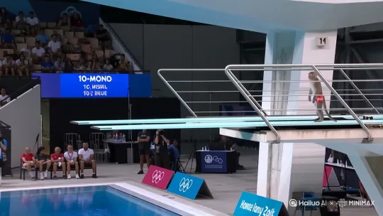 televised footage of a monkey in sports.wear from a 10m high diving platform, is doing an acrobatic dive into a swimming pool at the olympics, flips and spins, camera following by Hailuo AI Video Generator