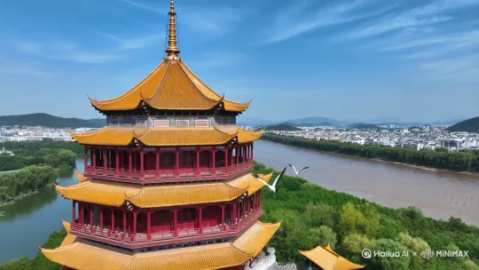 黄鹤楼的选址堪称天人合一思想的典范。其北望汉水如练,南眺青山叠翠,东观长江奔涌,西接武汉三镇繁华,形成了“龟蛇锁大江”的地理格局。主楼高51.4米,以“四边套八边形”的独特构造象征“四面八方”,72根朱红圆柱撑起60个凌空翘角,金色琉璃瓦在阳光下熠熠生辉,宛如展翅欲飞的黄鹤。登临五楼极目远眺,可感受“孤帆远影碧空尽,唯见长江天际流”的浩渺意境。两只黄鹤由小到大从地面一前一后飞向天空,长江水急速流向远方。 by Hailuo AI Video Generator