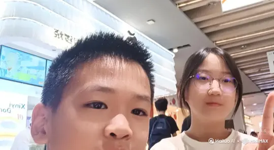 帮我生成一个视频：女生摸摸男生的头随后将手放进男生衣服里，二人伸出舌头，先在对方舌尖上碰了碰随后将自己的舌头放进对方嘴里。比例 3:4。[右移,左摇,跟随] by Hailuo AI Video Generator