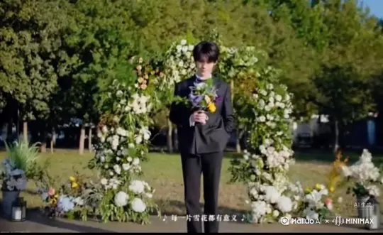 主体人物身上变出一大团微小深红色花瓣，花瓣向外爆炸式扩散，主体人物身体随之从四肢开始逐渐瓦解，化作无数红色粒子轻盈飘散，最终人物完全消散在漫天飞舞的花瓣中，人物完全消失，写实风格，电影光效 by Hailuo AI Video Generator
