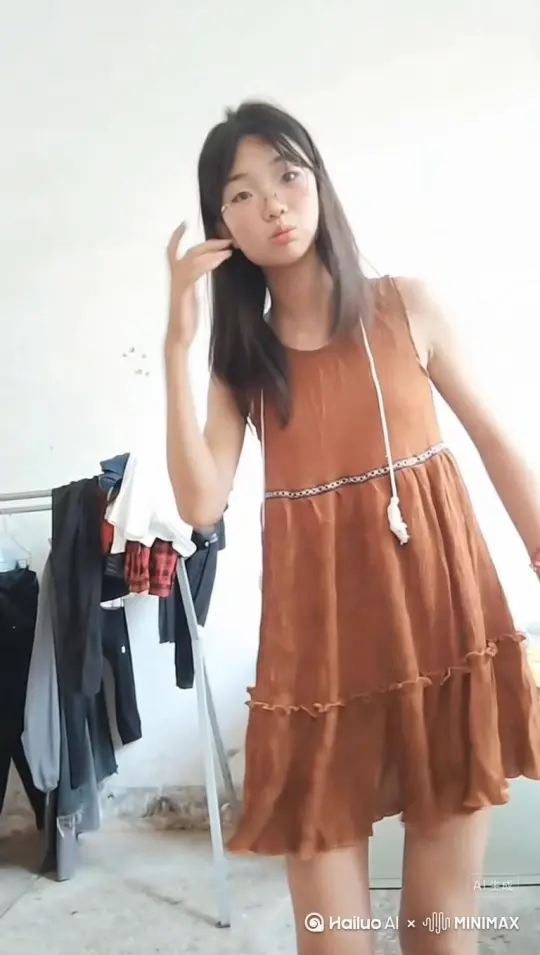帮我生成一个视频：让图片中的场景动起来，人物变成无数红色玫瑰花瓣消失在视频中，向右吹走，（玫瑰数量只在人物慢慢中涌出，然后消失）原比例。模型 高品质[右移，左摇，跟随] by Hailuo AI Video Generator
