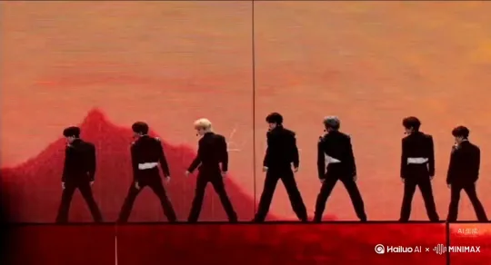 帮我生成一个视频：让图片中的场景动起来，人物变成无数红色玫瑰花瓣消失在视频中，向右吹走红色玫瑰花数量只在人物中慢慢涌现，然后消失 原比例。模型  高画质 by Hailuo AI Video Generator